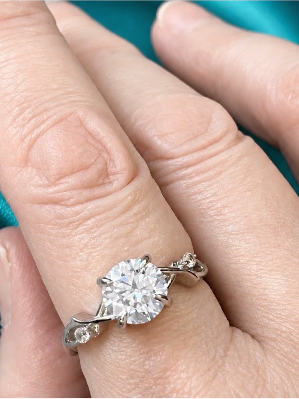 AAA Moissanite Solitaire, 8mm, 2ctw, D-color, VVSI, Rhodium over S925. SIZE 6